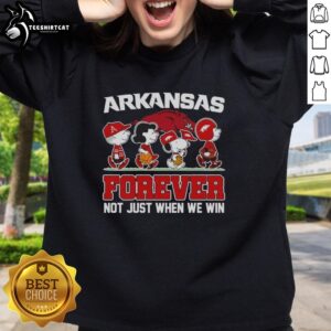 Awesome Peanuts x Arkansas Razorbacks sweatshirt featuring cartoon characters, perfect for die-hard fans year-round.