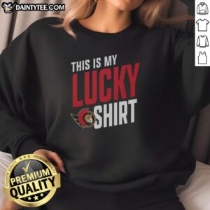 Alt Text: Person wearing an Awesome Ottawa Senators sweatshirt, showcasing team spirit and luck in vibrant colors.