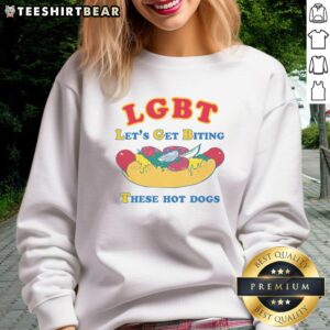 Funny LGBT Let's Get Biting These Hot Dogs sweatshirt featuring colorful graphics and a playful design for pride events.