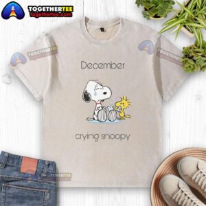 Pretty December crying Snoopy and Woodstock design on a washed t-shirt, perfect for Peanuts fans.