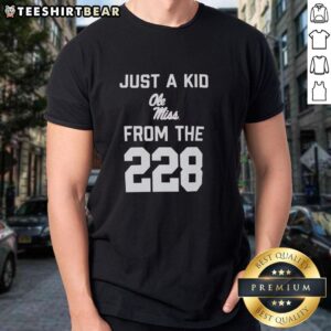 Alt Text: Top Just A Kid Ole Miss From The 228 T-Shirt featuring a stylish design and vibrant colors for Ole Miss fans.