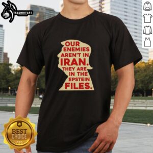 Alt Text: Original Trump Our Enemies Aren't In Iran, They Are In The Epstein Files T-Shirt design featuring bold graphic text.