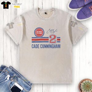 Alt Text: Top Pistons Cade Cunningham signature jersey washed t-shirt in blue, showcasing team logo and player name.