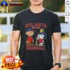 Alt Text: Charlie Brown, Snoopy, and Woodstock wearing Atlanta Braves baseball jersey T-shirt, celebrating Est 1961.
