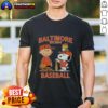 Charlie Brown, Snoopy, and Woodstock wearing Baltimore Orioles jersey on a fun t-shirt, celebrating the team's legacy since 1894.