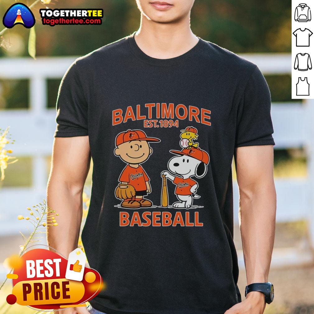 Top Charlie Brown Snoopy And Woodstock With Baltimore Orioles Baseball Jersey Est 1894 T-Shirt Charlie Brown, Snoopy, and Woodstock wearing Baltimore Orioles jersey on a fun t-shirt, celebrating the team's legacy since 1894.