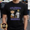 Alt Text: Charlie Brown, Snoopy, and Woodstock wearing a Colorado Rockies jersey on a T-shirt, established 1993.