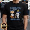 Alt Text: Charlie Brown, Snoopy, and Woodstock wearing a Detroit Tigers baseball jersey t-shirt, established 1894.