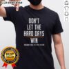 Top Don't Let The Hard Days Win Remember Who The Fk You Are T-Shirt featuring a motivational design and bold typography.