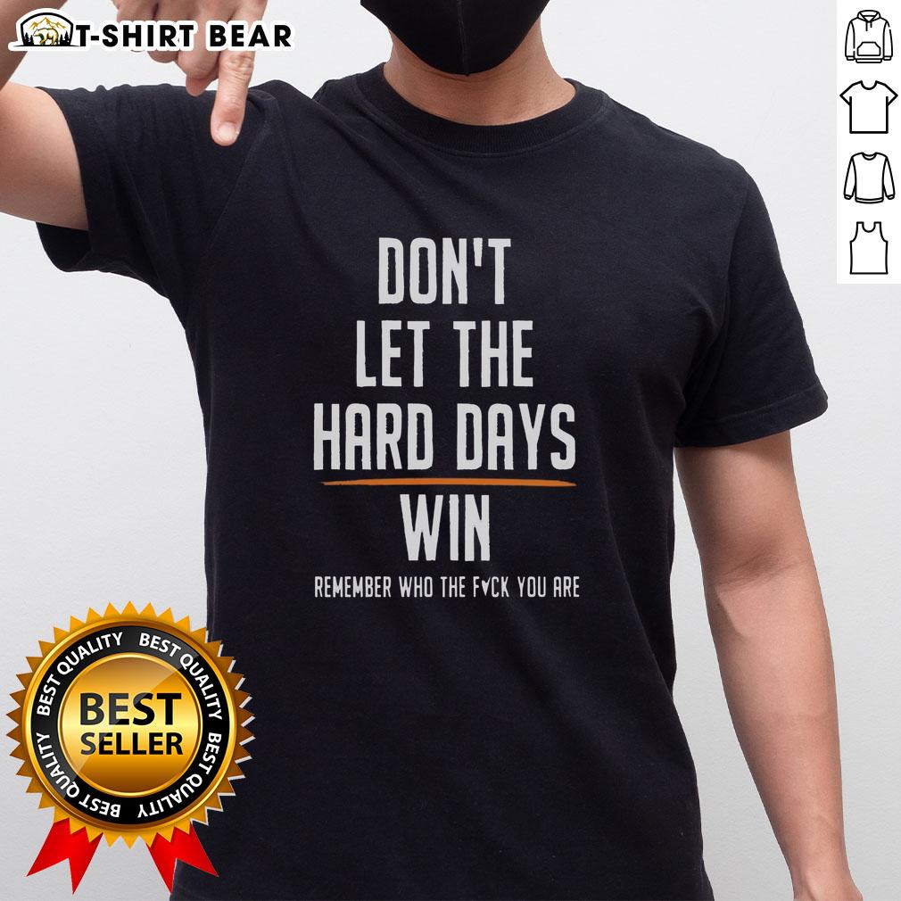 Top Don'T Let The Hard Days Win Remember Who The Fuck You Are T Shirt Top Don't Let The Hard Days Win Remember Who The Fk You Are T-Shirt featuring a motivational design and bold typography.