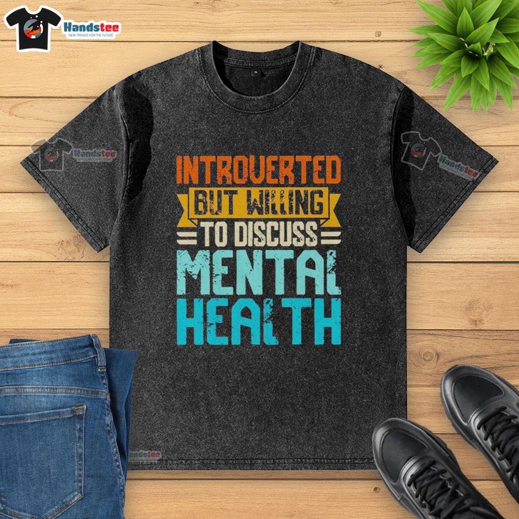 top-introverted-but-willing-to-discuss-mental-health-washed-t-shirt Alt Text: Top introverted washed t-shirt promoting discussions on mental health, featuring a stylish and casual design.