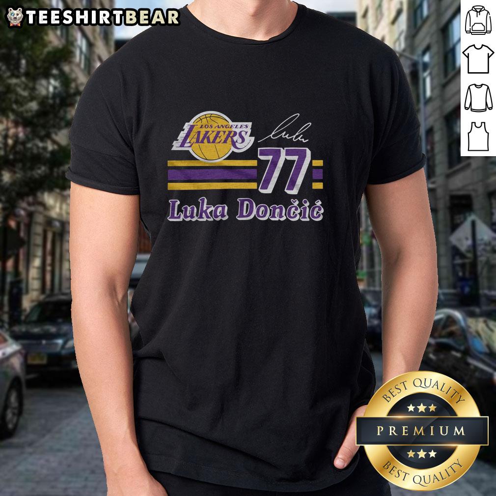 top-lakers-luka-doncic-signature-jersey-t-shirt Alt Text: Top Lakers Luka Doncic Signature Jersey T-Shirt in vibrant purple, showcasing player name and number design.