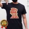 Alt Text: Top Our Enemies Aren't In Iran They Are In The Epstein Files T-Shirt design featuring bold text and graphic elements.