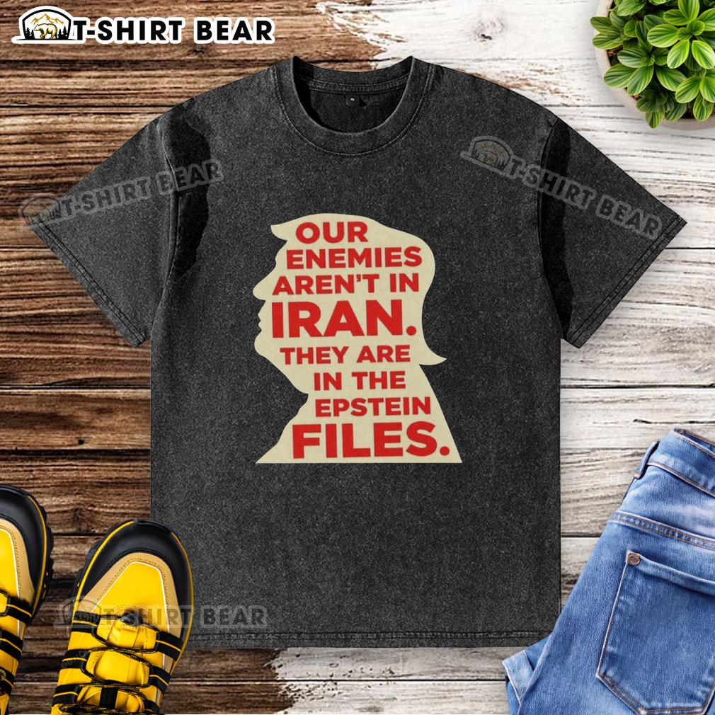 Top Our Enemies Aren'T In Iran They Are In The Epstein Files Washed T Shirt Alt Text: Top-Our-Enemies-Arent-In-Iran-They-Are-In-The-Epstein-Files-Washed-T-Shirt showcasing a bold statement on a trendy shirt.