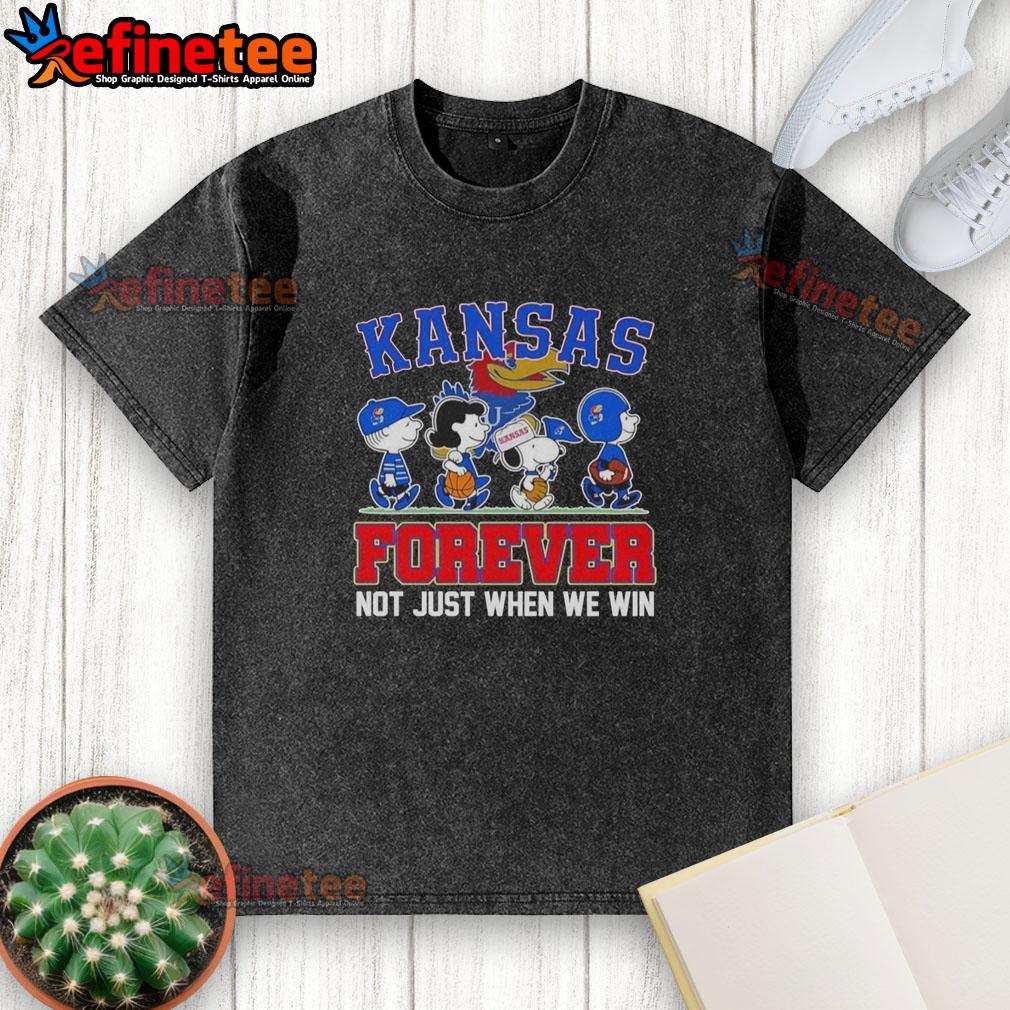 top-peanuts-x-kansas-jayhawks-forever-fan-not-just-when-we-win-cartoon-characters-washed-t-shirt Alt Text: Cartoon characters on a washed t-shirt celebrating Kansas Jayhawks fandom, Top Peanuts x Kansas Jayhawks Forever Fan.