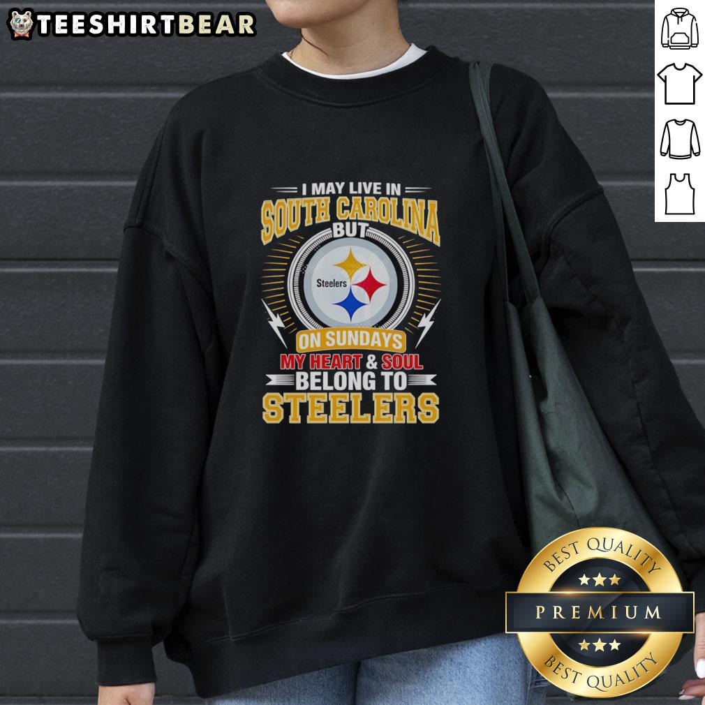 top-pittsburgh-steelers-i-live-in-south-carolina-but-on-sundays-my-heart-and-soul-belong-to-steelers-sweatshirt Cozy sweatshirt featuring 'I Live In South Carolina But My Heart Belongs To Steelers' for Pittsburgh Steelers fans.