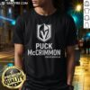 Top Puck McCrimmon Vegas Golden Knights logo T-shirt featuring vibrant team colors and iconic design.