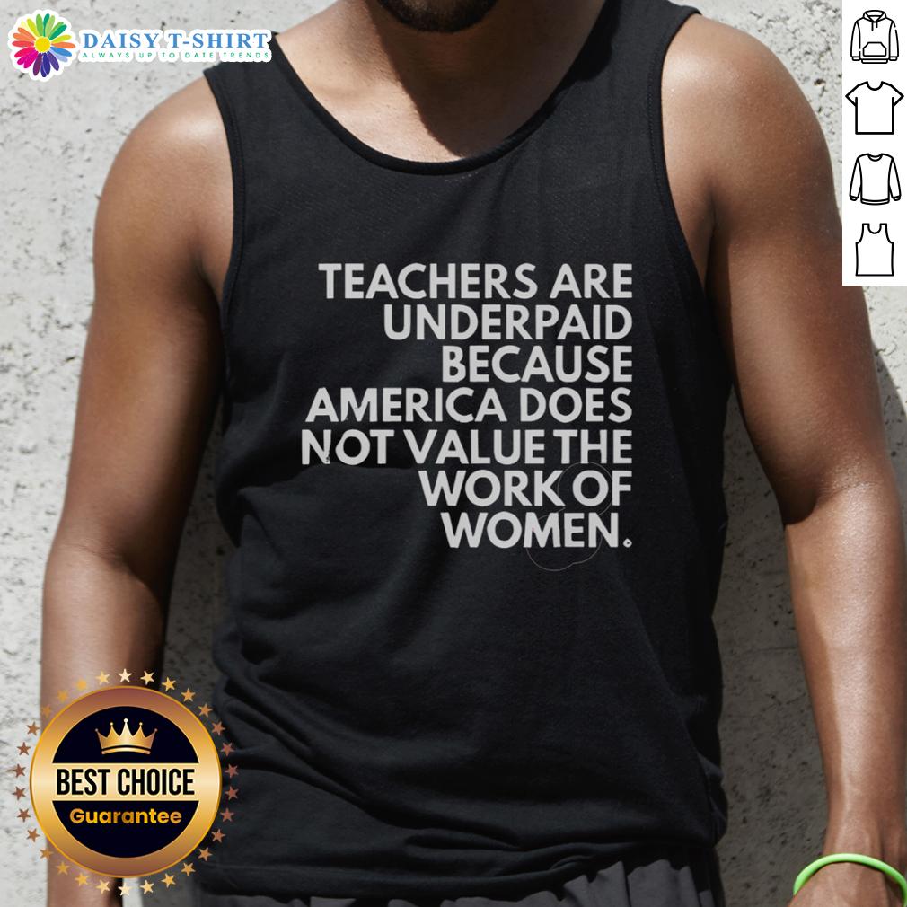 Top Teachers Are Underpaid Because America Does Not Value The Work Of Women Tank Top Female teacher wearing a tank top that reads 'Top Teachers Are Underpaid' highlighting the undervaluation of women's work.