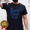 Top The Swell Don't Lie T-Shirt featuring a vibrant design, perfect for beach lovers and casual wear enthusiasts.
