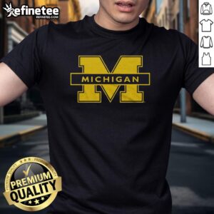 Stylish University of Michigan T-shirt featuring the iconic logo, perfect for fans and alumni to show school spirit.