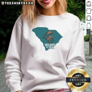 Alt Text: Cozy teal sweatshirt featuring the Coastal Carolina Chanticleers logo, perfect for fans all year round.