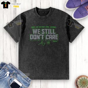 Awesome AJ Barner We Still Don't Care washed t-shirt in a stylish design, perfect for casual wear and expressing individuality.