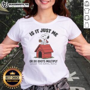 Funny Snoopy ladies tee featuring the phrase 'Do Idiots Multiply Quicker Than Normal People?' Perfect for casual wear.