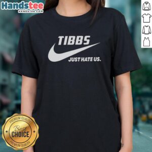 Alt Text: Official Tibbs Just Hate Us Parody Logo on a stylish ladies tee, perfect for fans of humorous graphic apparel.