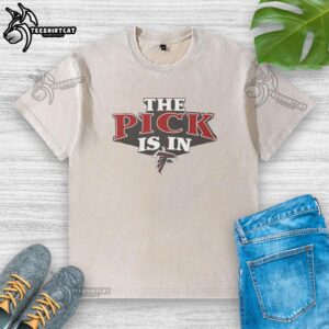 Alt Text: Awesome Atlanta Falcons pick is in washed t-shirt featuring team logo, perfect for fans supporting their favorite NFL team.