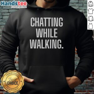 Friends enjoying a fun chat while wearing a cozy Funny Hoodie during a walk in the park.