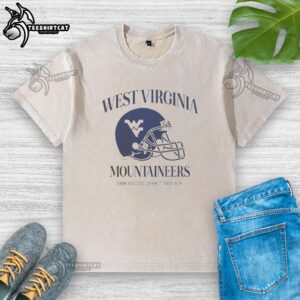 Official West Virginia Mountaineers 'Earn Success, Earn It Together' washed t-shirt showcasing team spirit and style.