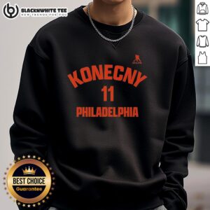 Travis Konecny 11 Philadelphia Flyers sweatshirt displayed on a mannequin, showcasing team colors and logo.