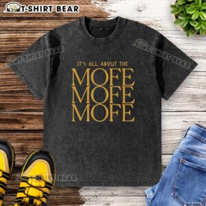 Premium retro washed t-shirt featuring 'Money Over Friends & Enemies' slogan for a stylish streetwear look.