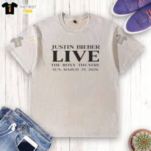 Justin Bieber performing live at The Roxy Theatre on March 29, 2026, wearing a washed T-shirt during his tour.