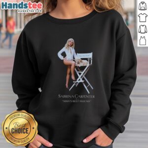 Sabrina Carpenter wearing a 'Man's Best Friend' sweatshirt, showcasing her stylish and cozy fashion choice.