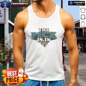 Good Jacksonville Jaguars pick is in tank top, showcasing team pride and style at a game day event.