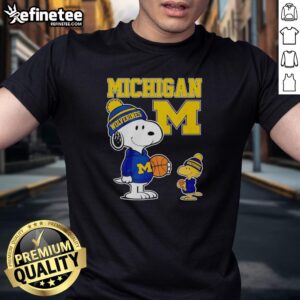 Original Snoopy and Woodstock in Michigan Wolverines jersey t-shirt, showcasing a unique fan design for sports enthusiasts.