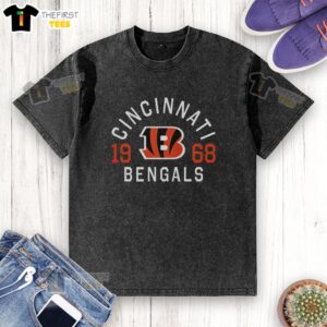 Alt Text: Official Cincinnati Bengals Heritage Print Washed T-Shirt featuring vintage logo and comfortable fit for fans.