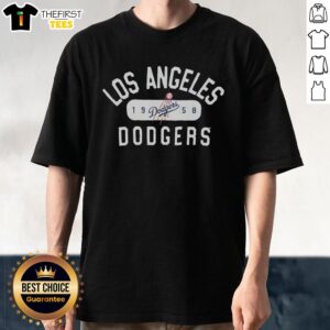Alt Text: Vintage 1958 Los Angeles Dodgers logo t-shirt featuring classic blue and white design, perfect for baseball fans.