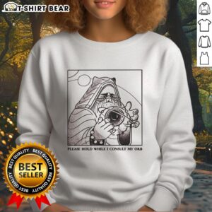 Official Please Hold While I Consult My Orb Sweatshirt featuring a whimsical design for casual wear.