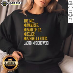 Alt Text: Jacob Misiorowski wearing Nice The Miz sweatshirt featuring Mizard of Oz design in vibrant colors.
