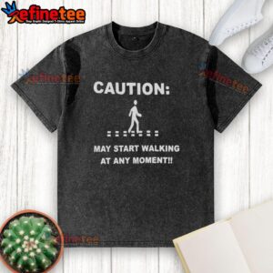 Alt Text: Original caution may start walking at any moment washed t-shirt featuring a playful graphic design.