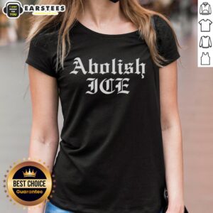 Awesome Brody King wearing an Abolish ICE ladies tee, showcasing bold activism and stylish design in casual wear.