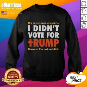 Alt Text: Premium sweatshirt with clear orange text 'I Didn't Vote For Trump Because I'm Not An Idiot' for political conscience.