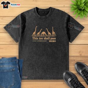 Alt Text: Humorous washed t-shirt featuring pretty dinosaurs and the phrase This Too Shall Pass for inspirational fashion.