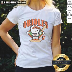 Alt Text: Cute Baltimore Orioles Hello Kitty ladies tee featuring a playful design, perfect for fans and fashion lovers alike.