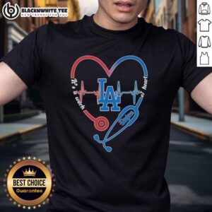 Alt Text: Top Los Angeles Dodgers Stethoscope Heartbeat T-Shirt showcasing a heart design, perfect for baseball fans and healthcare workers.