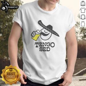 Man wearing 'Friday Beers' T-shirt enjoying a cold beer in Mexico, showcasing a fun and relaxed vibe.