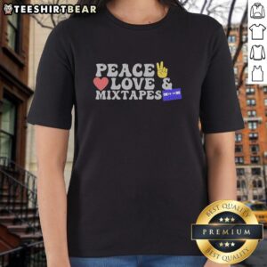 Retro ladies tee featuring 'Peace, Love, and Mixtapes' cassette design, perfect for music lovers and vintage enthusiasts.