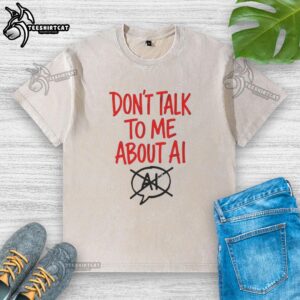 Casual washed t-shirt featuring 'Don't Talk to Me About AI' slogan, perfect for tech enthusiasts and humor lovers.